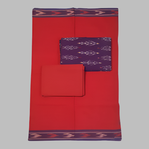 Red fabric with purple patterned fabric folded on top