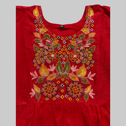 Red garment with colorful floral embroidery on a white background