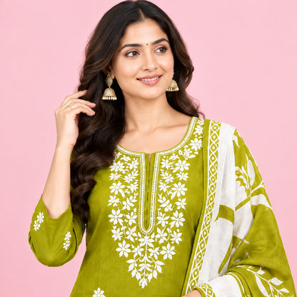 A mustard yellow and white printed cotton garment, likely a kurta or dress, shown folded with a matching pocket or pouch. The fabric features white floral and leaf patterns, with a yellow embroidered neckline detail on the upper section.
