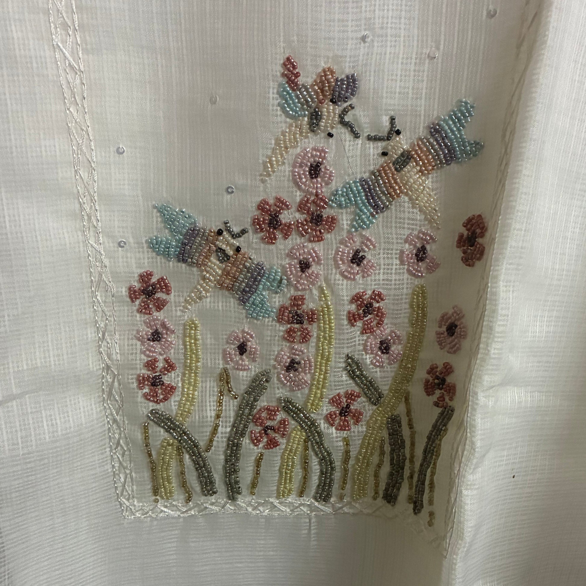 Embroidered patch on a white fabric background