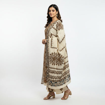Woman wearing a patterned kurta with a white background