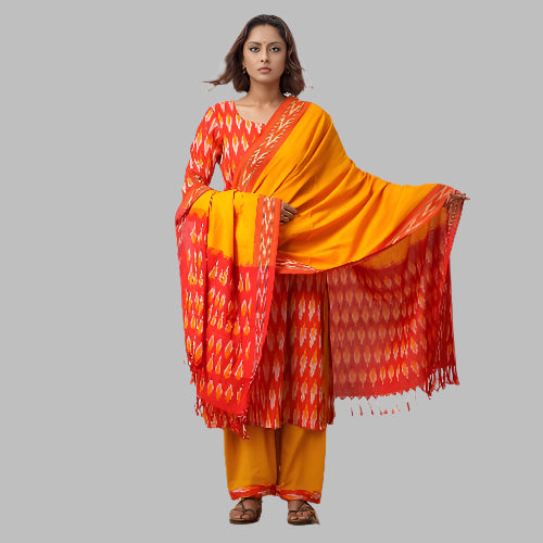 Woman wearing a traditional outfit with a yellow and red pattern on a white background