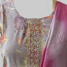 Mannequin wearing a floral-patterned kurta with a pink dupatta on a white background