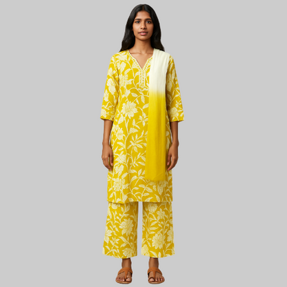 Woman wearing a yellow floral outfit on a white background