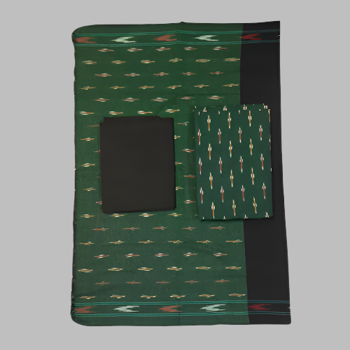 Green patterned fabric with a black square and folded piece on a white background
