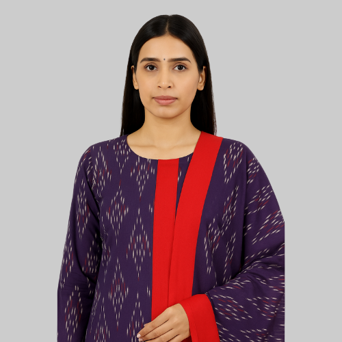 Woman wearing a purple and red traditional outfit on a white background