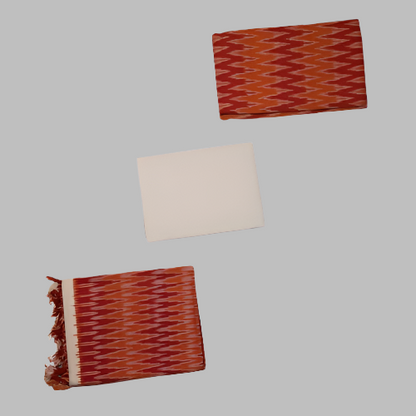 Two woven fabric samples, one red and white patterned, one plain beige, on a white background.