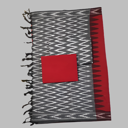 Gray and red patterned blanket with black tassels on a white background