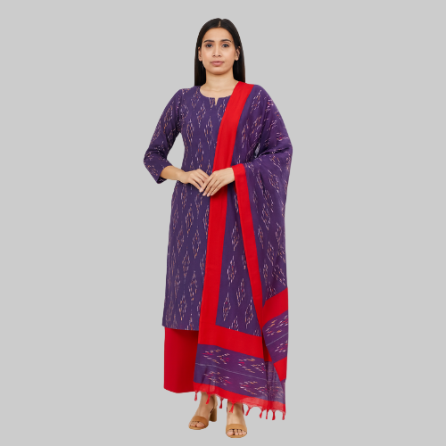 Woman wearing a purple and red traditional outfit on a white background